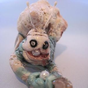 This is an original polymer clay snail creation of mine.  I gave it to the FISH GUY in Excelsior as