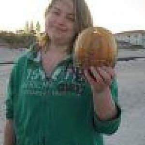 This is my daughter and a horseshoe shell we found on our trip to Florida, winter of 2009.