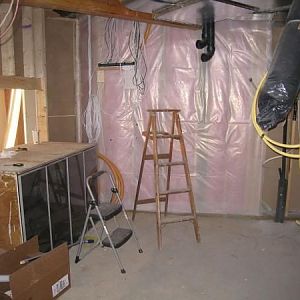 behind tank sheetrocked. No electrical